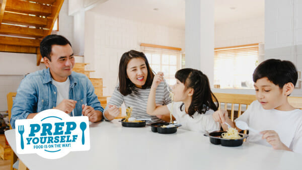 An Asian family enjoying a meal