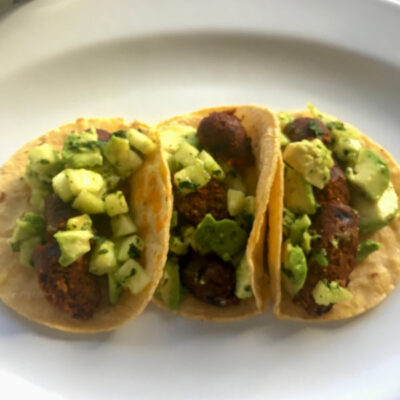 Grilled Plant-based Spicy Sausage Tacos with Avocado Pineapple Salsa